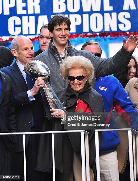 New York Giants player Eli Manning and Ann Mara attend the New York Giants Victory Parade following their Super Bowl XLVI win down the Canyon of...