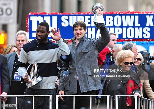 New York Giants players Justin Tuck, Eli Manning and Ann Mara attend the New York Giants Victory Parade following their Super Bowl XLVI win down the...