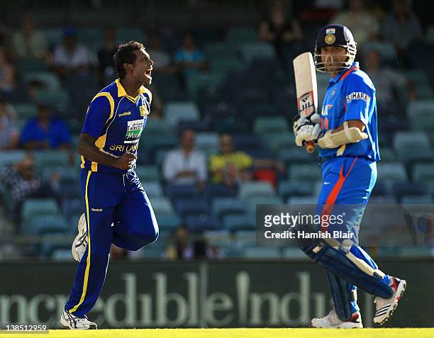 Angelo Mathews of Sri Lanka celebrate after taking the wicket of Sachin Tendulkar of India during the One Day International match between India and...