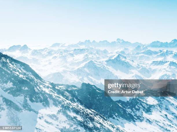 the beautiful french alps covered with snow and blue colors. - provence alpes cote dazur ストックフォトと画像