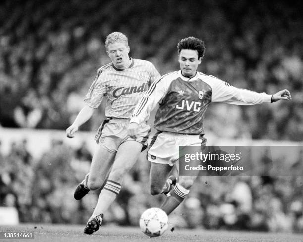 Arsenal winger Anders Limpar is chased by Liverpool defender David Burrows during their First Division match at Highbury in London, 2nd December...