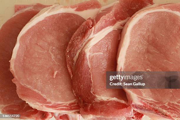 Pork chops purchased at a local discount supermarket lie on a plate in this photo illustration on February 8, 2012 in Berlin, Germany. The online...