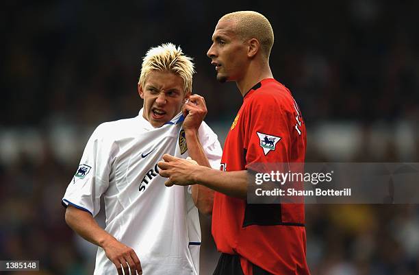 Rio Ferdinand of Manchester United and Alan Smith of Leeds United wait for the goal kick during the FA Barclaycard Premiership match between Leeds...