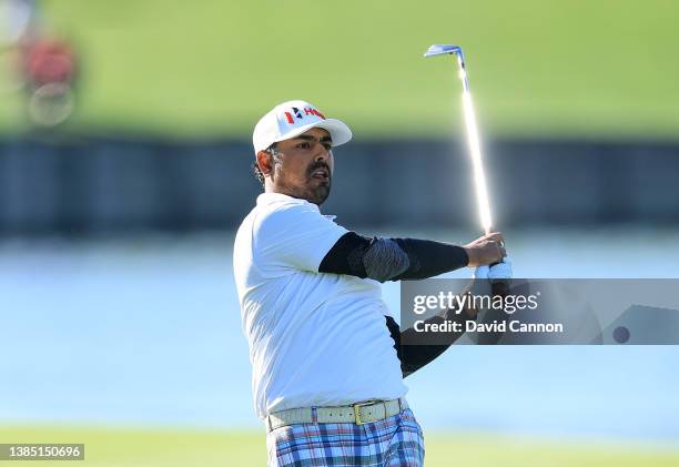 Anirban Lahiri of India plays his second shot on the par 4, 18th hole during completion of the weather delayed third round of THE PLAYERS...