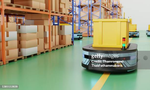 autonomous robot transporting parcel and stock in warehouse with copy space. automation agv storage vehicle. technology innovation and industry concept. 3d illustration rendering - truck stock illustrations ストックフォトと画像