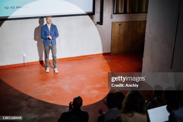 public speaker at diversity in workplace convention. - business conference stock pictures, royalty-free photos & images
