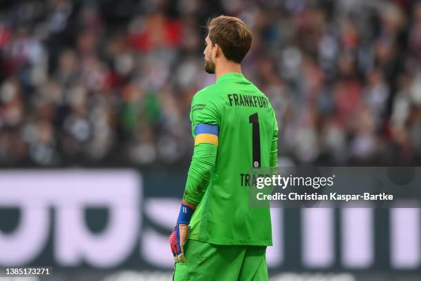 Kevin Trapp of Eintracht Frankfurt is seen wearing a captain`s armband in Ukraine colors during the Bundesliga match between Eintracht Frankfurt and...