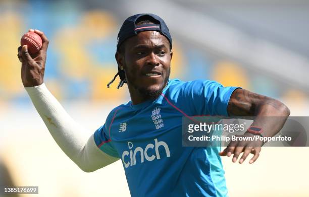 Jofra Archer of England throws a ball during a training session before the second Test between West Indies and England at Kensington Oval on March...