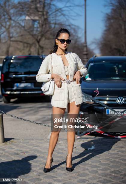 Anna Rosa Vitiello wearing beige jacket, white bag, shorts, cropped top outside Chanel during Paris Fashion Week - Womenswear F/W 2022-2023 on March...