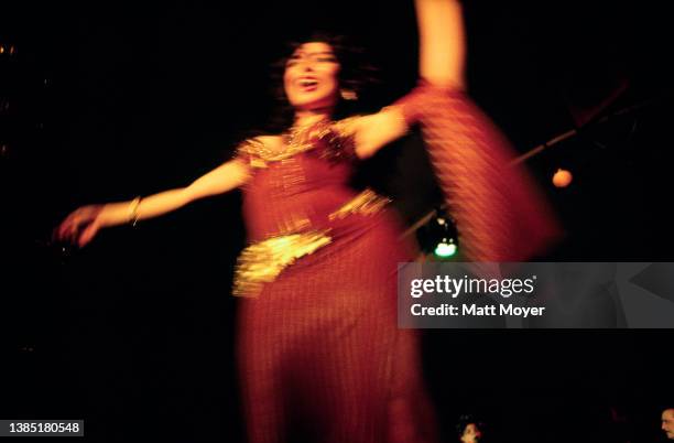 Egyptian belly dancer and actress Dina Talaat performs at the Sheraton Cairo Hotel on January 1, 1998. Dina Talaat Sayed Muhammad is a popular...