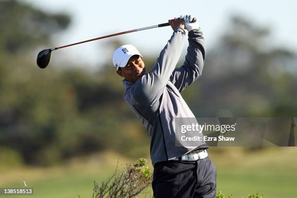 Tiger Woods hits his tee shot during the practice round for the AT&T Pebble Beach National Pro-Am at the Monterey Peninsula Country Club on February...
