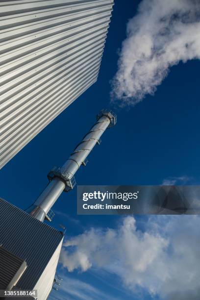 gas turbine chimney - district heating plant stock pictures, royalty-free photos & images