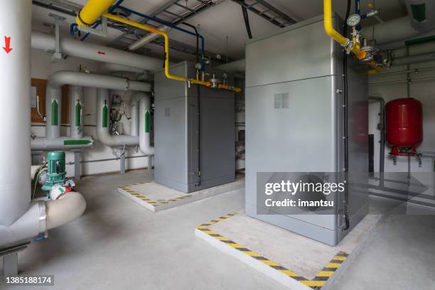 modern gas condensing boilers - energy industry heat steam stock pictures, royalty-free photos & images