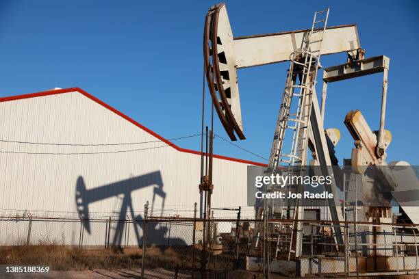 An oil pumpjack pulls oil from the Permian Basin oil field on March 14, 2022 in Odessa, Texas. U.S. President Joe Biden imposed a ban on Russian oil,...
