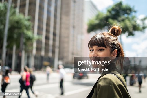 Portrait of a young woman in the street Portrait of a young woman in the street
