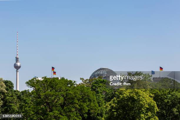 reichstag dome and television tower berlin, germany - tiergarten stockfoto's en -beelden