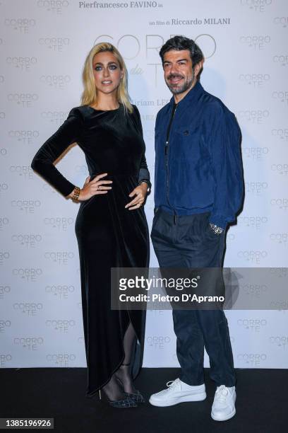 Miriam Leone and Pierfrancesco Favino attend the photocall of the movie "Corro Da Te" on March 14, 2022 in Milan, Italy.