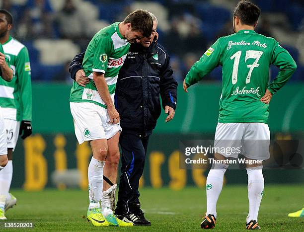 Christopher Noethe of Fuerth must leavethe pitch injured during the DFB Cup Quarter Final match between TSG 1899 Hoffenheim and SpVgg Greuther Fuerth...