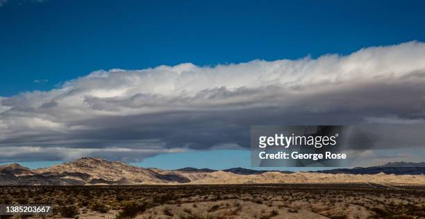 Wind and snow storm builds along the mountains of the Spirit Mountain Wilderness as viewed from Highway 163 on March 10, 2021 in Laughlin, Nevada....