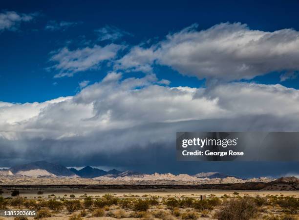 Wind and snow storm builds along the mountains of the Spirit Mountain Wilderness as viewed from Highway 163 on March 10, 2021 in Laughlin, Nevada....