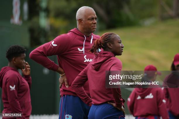Courtney Walsh, head coach of the West Indies and Stafanie Taylor of the West Indies look on prior to the 2022 ICC Women's Cricket World Cup match...