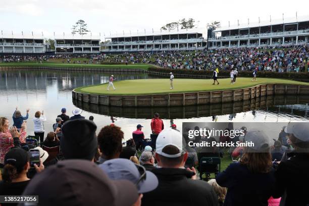 General view is seen as Cameron Smith of Australia waves on the 17th green during the final round of THE PLAYERS Championship on the Stadium Course...