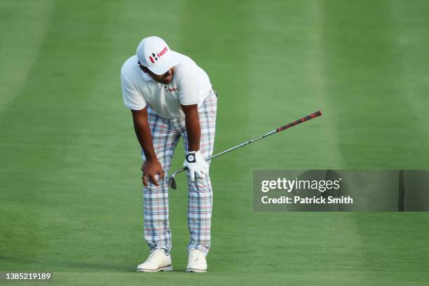 Anirban Lahiri of India reacts to his chip shot on the 18th hole during the final round of THE PLAYERS Championship on the Stadium Course at TPC...