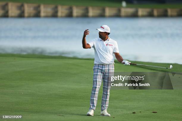 Anirban Lahiri of India reacts to his shot on the 18th hole during the final round of THE PLAYERS Championship on the Stadium Course at TPC Sawgrass...