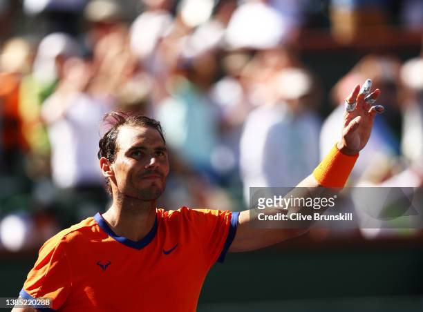 Rafael Nadal of Spain waves to the crowd after his straight sets victory against Dan Evans of Great Britain in their third round match on Day 8 of...