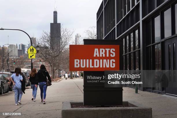 Students leave Whitney Young Magnet High School at the end of the school day on March 14, 2022 in Chicago, Illinois. As COVID-19 cases continue to...