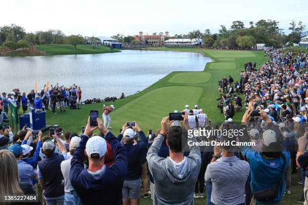 Cameron Smith of Australia plays his tee shot on the final hole the par 4, 18th hole during the final round of THE PLAYERS Championship at TPC...