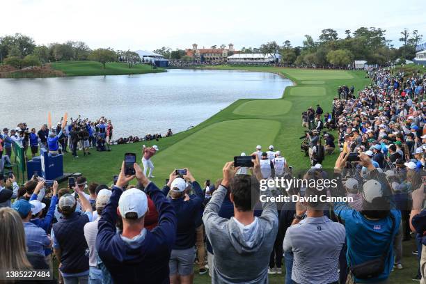 Cameron Smith of Australia plays his tee shot on the final hole the par 4, 18th hole during the final round of THE PLAYERS Championship at TPC...