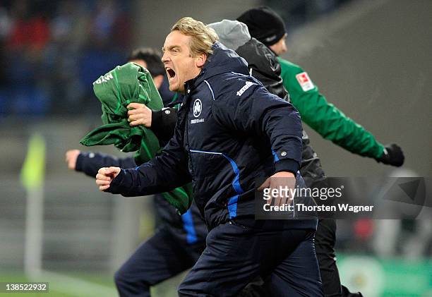 Head coach Mike Bueskens of Fuerth celebrates after winning the DFB Cup Quarter Final match between TSG 1899 Hoffenheim and SpVgg Greuther Fuerth at...