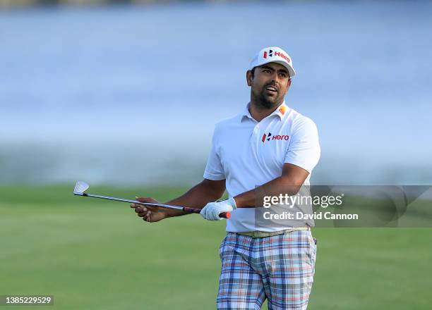 Anirban Lahiri of India plays his second shot on the par 4, 18th hole the final round of THE PLAYERS Championship at TPC Sawgrass on March 14, 2022...
