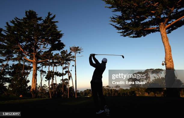 Tiger Woods hits his tee shot on the first hole during a practice round for the AT&T Pebble Beach National Pro-Am at the Monterey Peninsula Country...