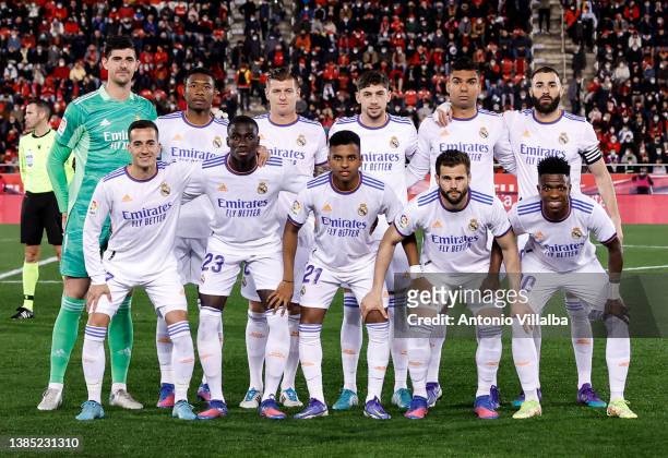 Real Madrid's players pose for a group picture before the start of the Spanish League football match between RCD Mallorca and Real Madrid CF at...
