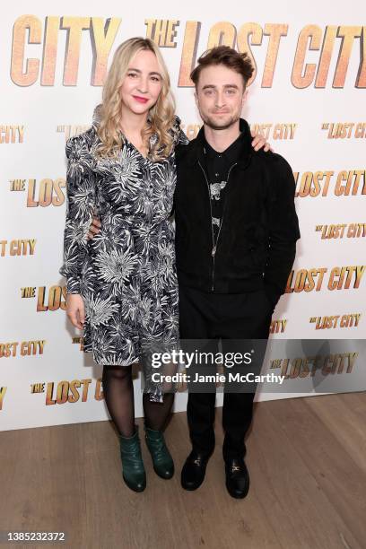 Erin Darke and Daniel Radcliffe attend a screening of "The Lost City" at the Whitby Hotel on March 14, 2022 in New York City.