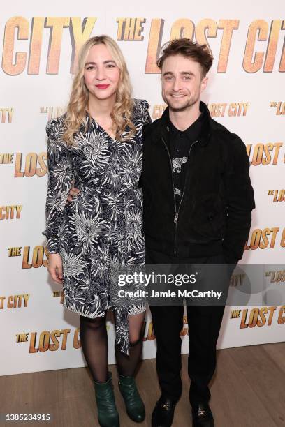 Erin Darke and Daniel Radcliffe attend a screening of "The Lost City" at the Whitby Hotel on March 14, 2022 in New York City.