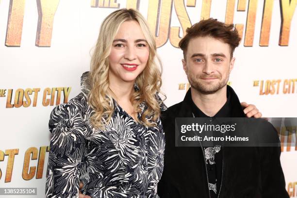 Erin Darke and Daniel Radcliffe attend a screening of "The Lost City" at the Whitby Hotel on March 14, 2022 in New York City.