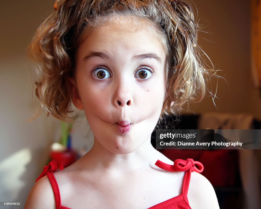 Girl Making Fish Face High-Res Stock Photo - Getty Images
