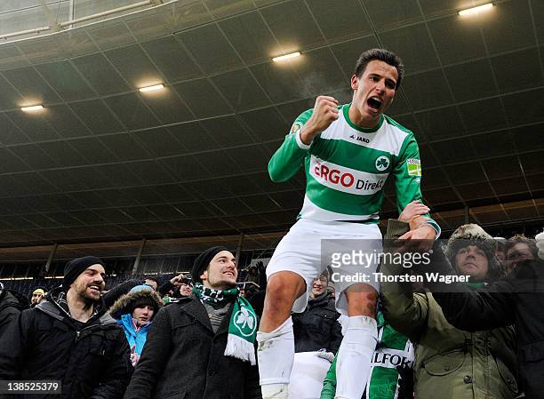 Egar Prib of Fuerth celebrates with the fans after winning the DFB Cup Quarter Final match between TSG 1899 Hoffenheim and SpVgg Greuther Fuerth at...
