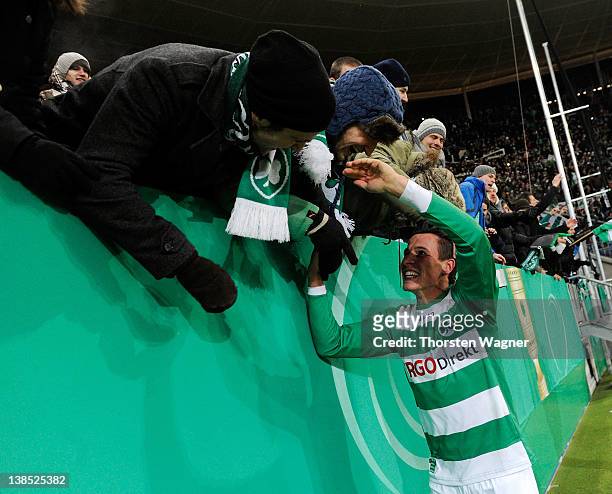 Egar Prib of Fuerth celebrates with the fans after winning the DFB Cup Quarter Final match between TSG 1899 Hoffenheim and SpVgg Greuther Fuerth at...