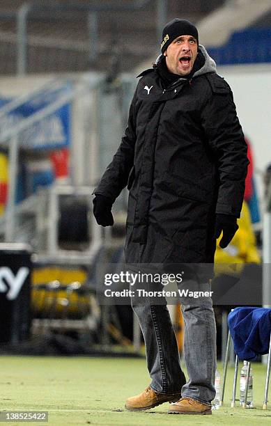 Head coach Holger Stanislawski of Hoffenheim gestures during the DFB Cup Quarter Final match between TSG 1899 Hoffenheim and SpVgg Greuther Fuerth at...