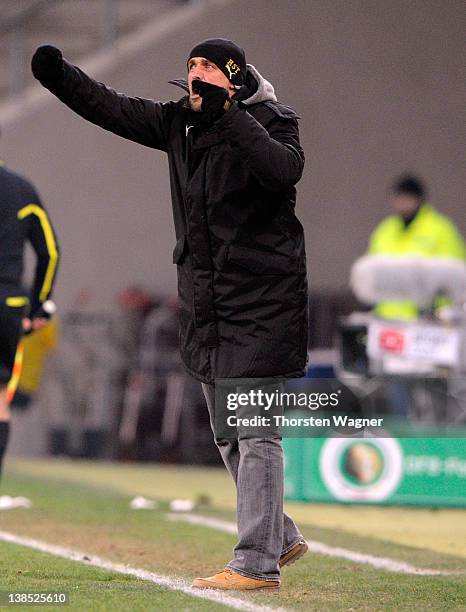 Head coach Holger Stanislawski of Hoffenheim gestures during the DFB Cup Quarter Final match between TSG 1899 Hoffenheim and SpVgg Greuther Fuerth at...