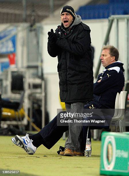 Head coach Holger Stanislawski of Hoffenheim gestures during the DFB Cup Quarter Final match between TSG 1899 Hoffenheim and SpVgg Greuther Fuerth at...
