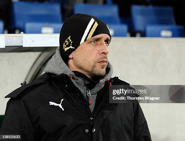 Head coach Holger Stanislawski of Hoffenheim looks on prior to the DFB Cup Quarter Final match between TSG 1899 Hoffenheim and SpVgg Greuther Fuerth...