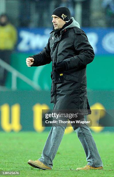 Holger Stanislawski of Hoffenheim looks dejected after loosing the DFB Cup Quarter Final match between TSG 1899 Hoffenheim and SpVgg Greuther Fuerth...