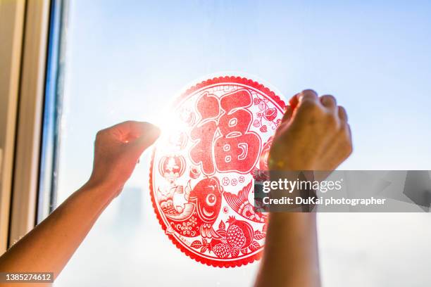 chinese new year elements blessing - 'fu' in window - heritage round one stock pictures, royalty-free photos & images