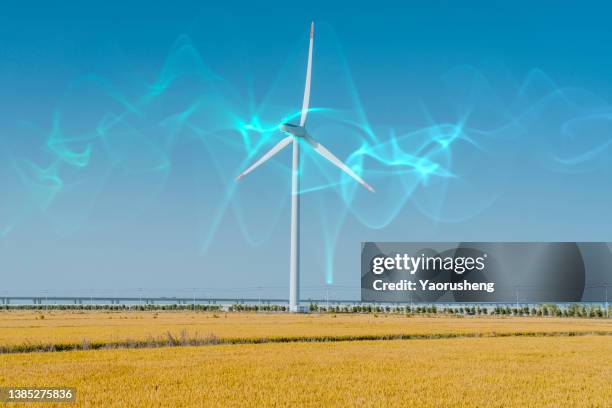 abstract blue energy wave,emiting from the widmill,net zero concept photo - electromagnetic stock pictures, royalty-free photos & images