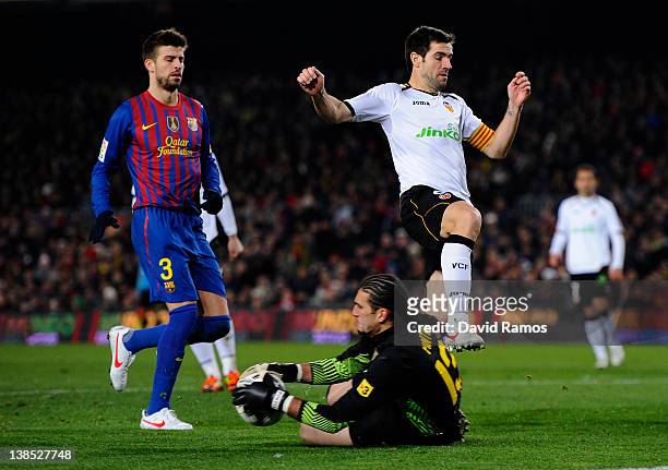 Goalkeeper Jose Manuel Pinto of FC Barcelona saves a shot from David Albelda of Valencia during the Copa del Rey Semi Final 2nd leg match between FC...